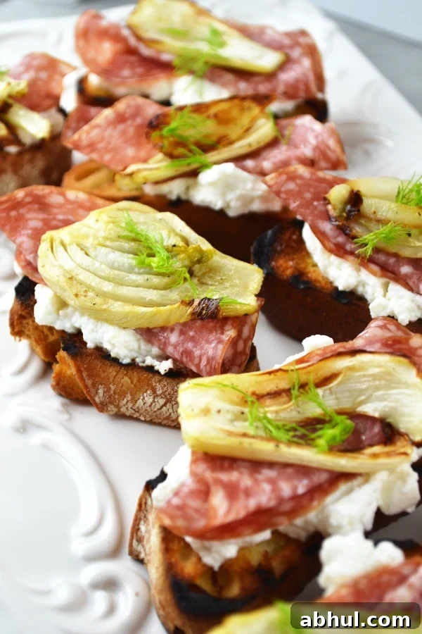 Roasted fennel, salami and ricotta crostini