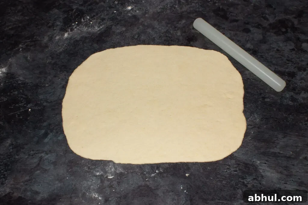 Pizza dough rolled out