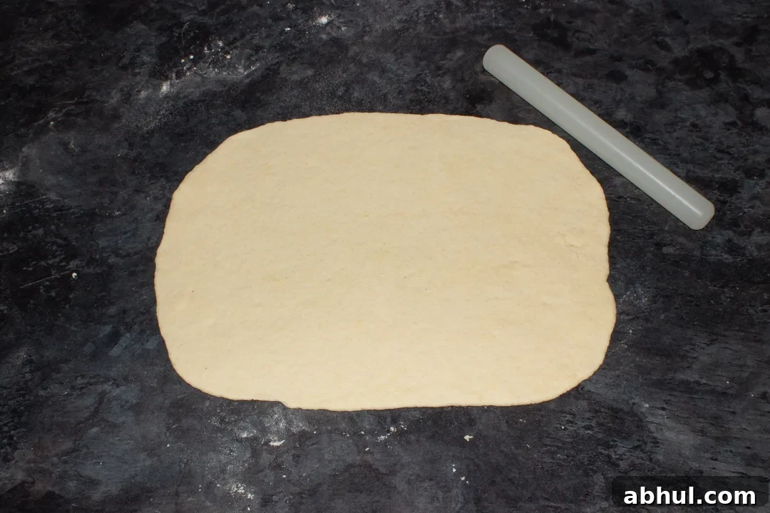 Pizza dough rolled out