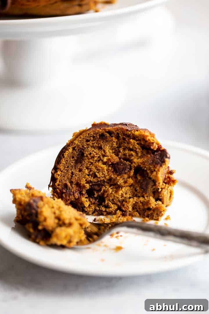 a slice of bundt cake on a white plate 