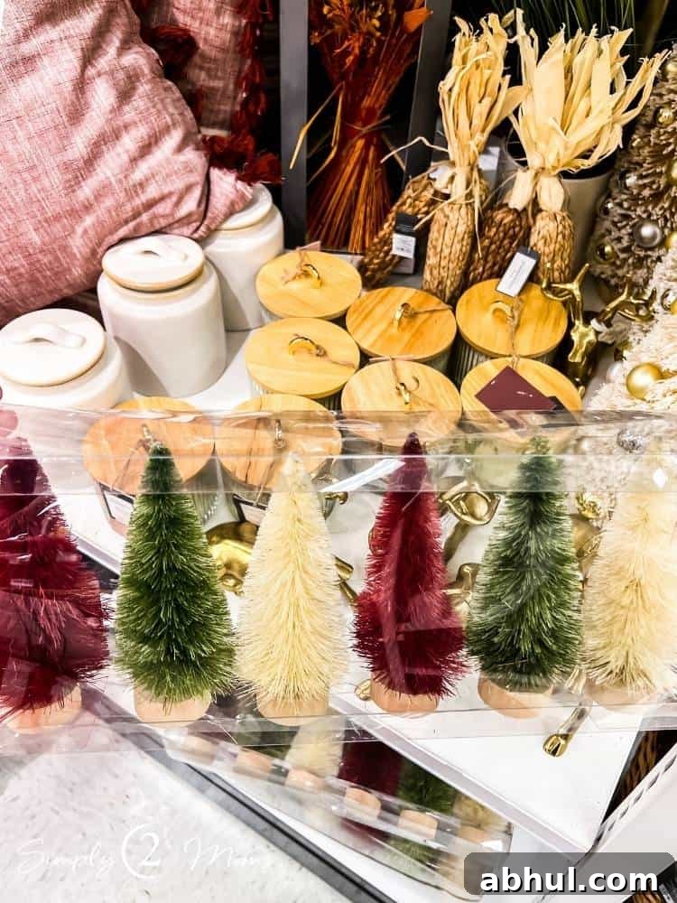 Top Target Christmas Decor Picks for Festive Holiday Style 6 AnnMarie holding package of six small bottle brush trees
