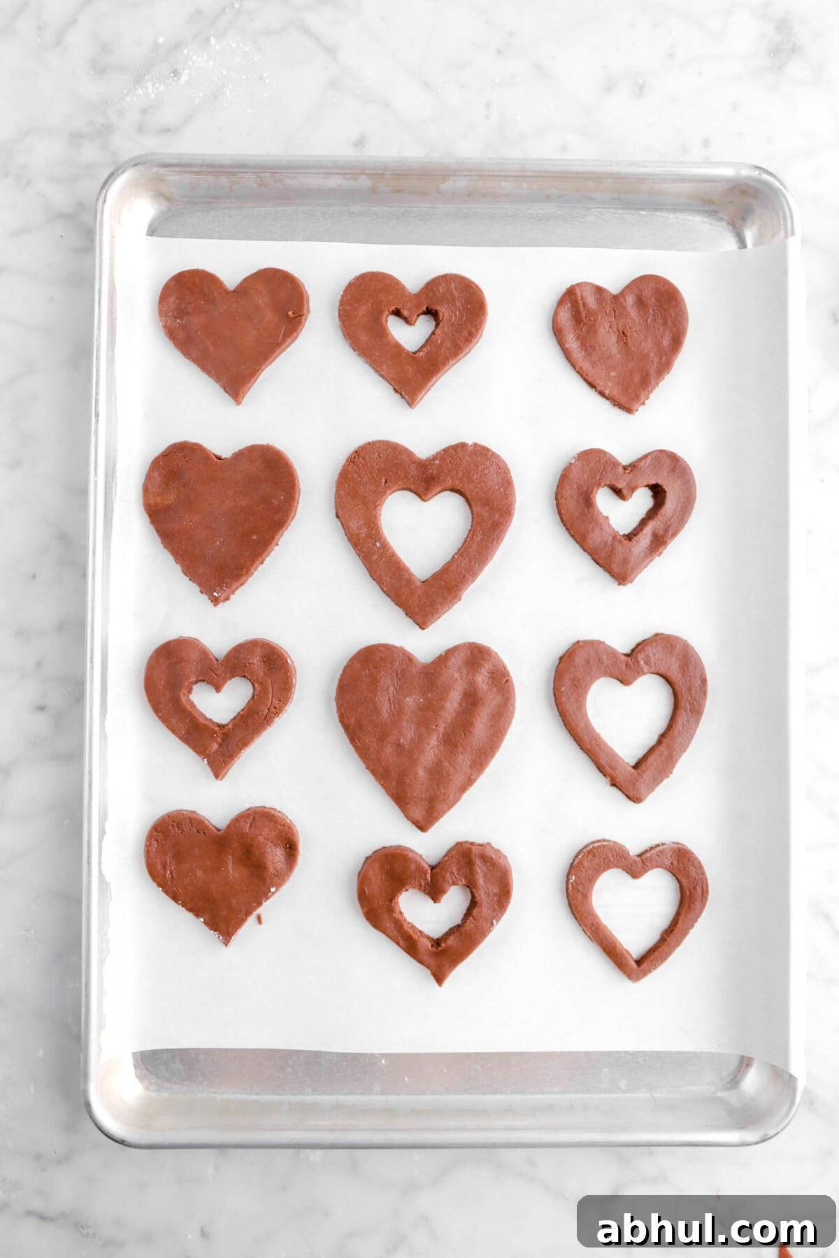 Chocolate-Strawberry Linzer Cookie Recipe for Perfect Sandwich Cookies 22 centers cut out of half of cookies