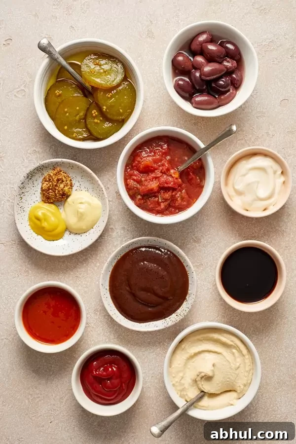 An array of condiments in small bowls. 