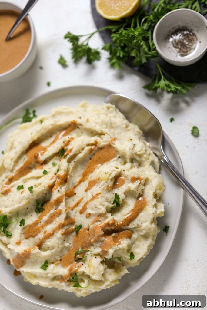 Cauliflower Mashed Potatoes with Almond Butter Gravy by Flora & Vino