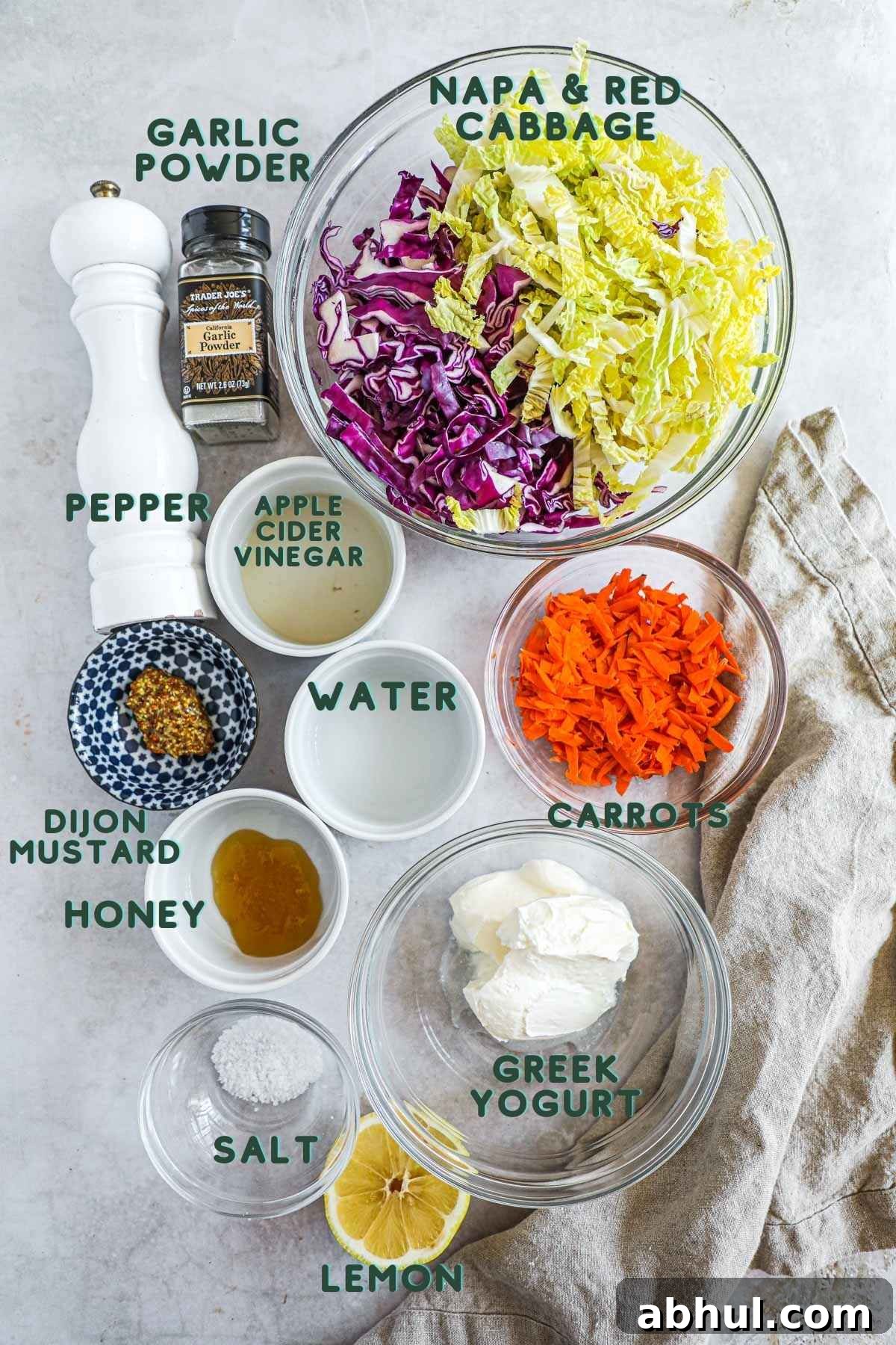 Ingredients to make Slow cooker BBQ pulled chicken burgers (sandwiches and sliders) with homemade cabbage coleslaw.
