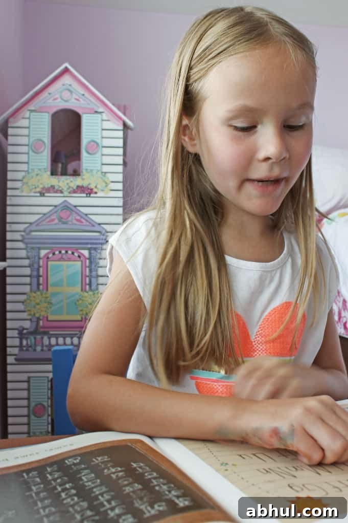 Girl with blond hair reading a book