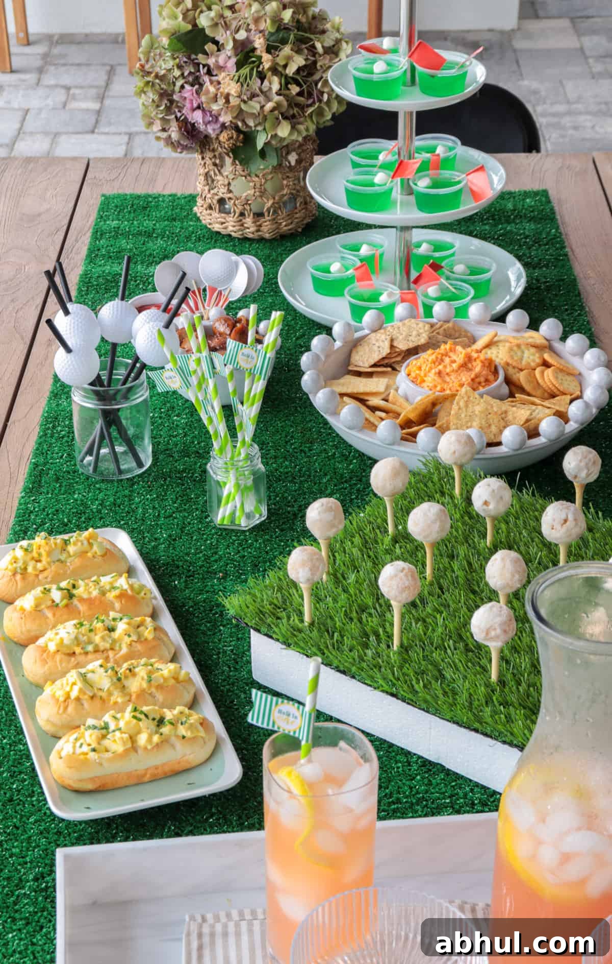 Masters party table with food and drinks.