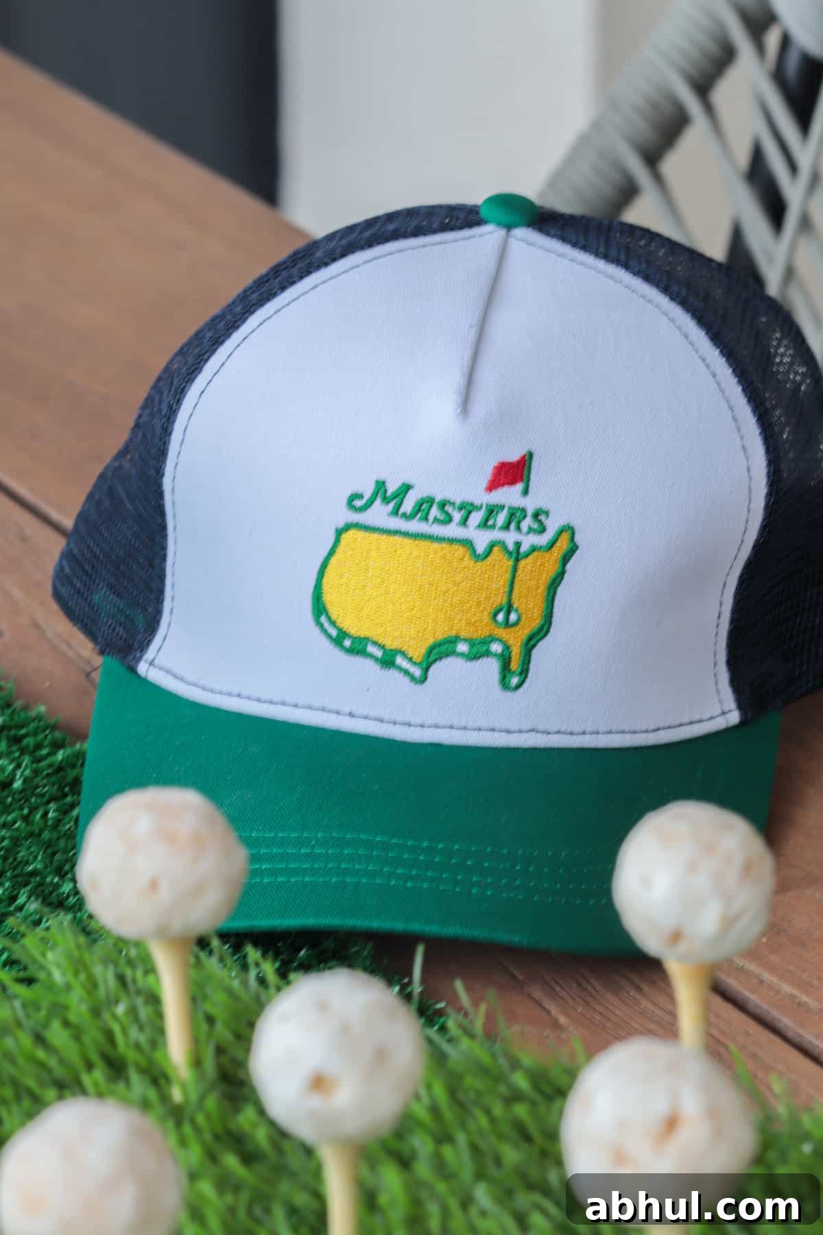 Masters hat on table.