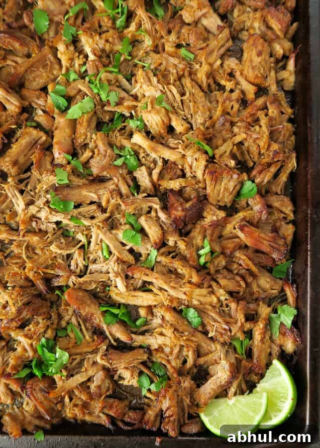 Easy Carnitas crisped under the broiler in a sheet pan