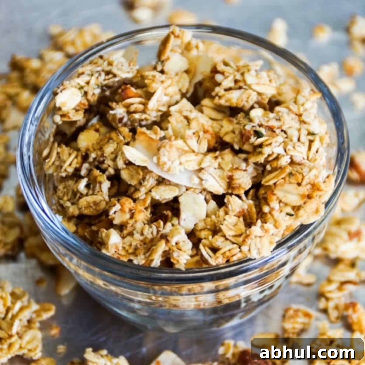 Granola in a small glass bowl.