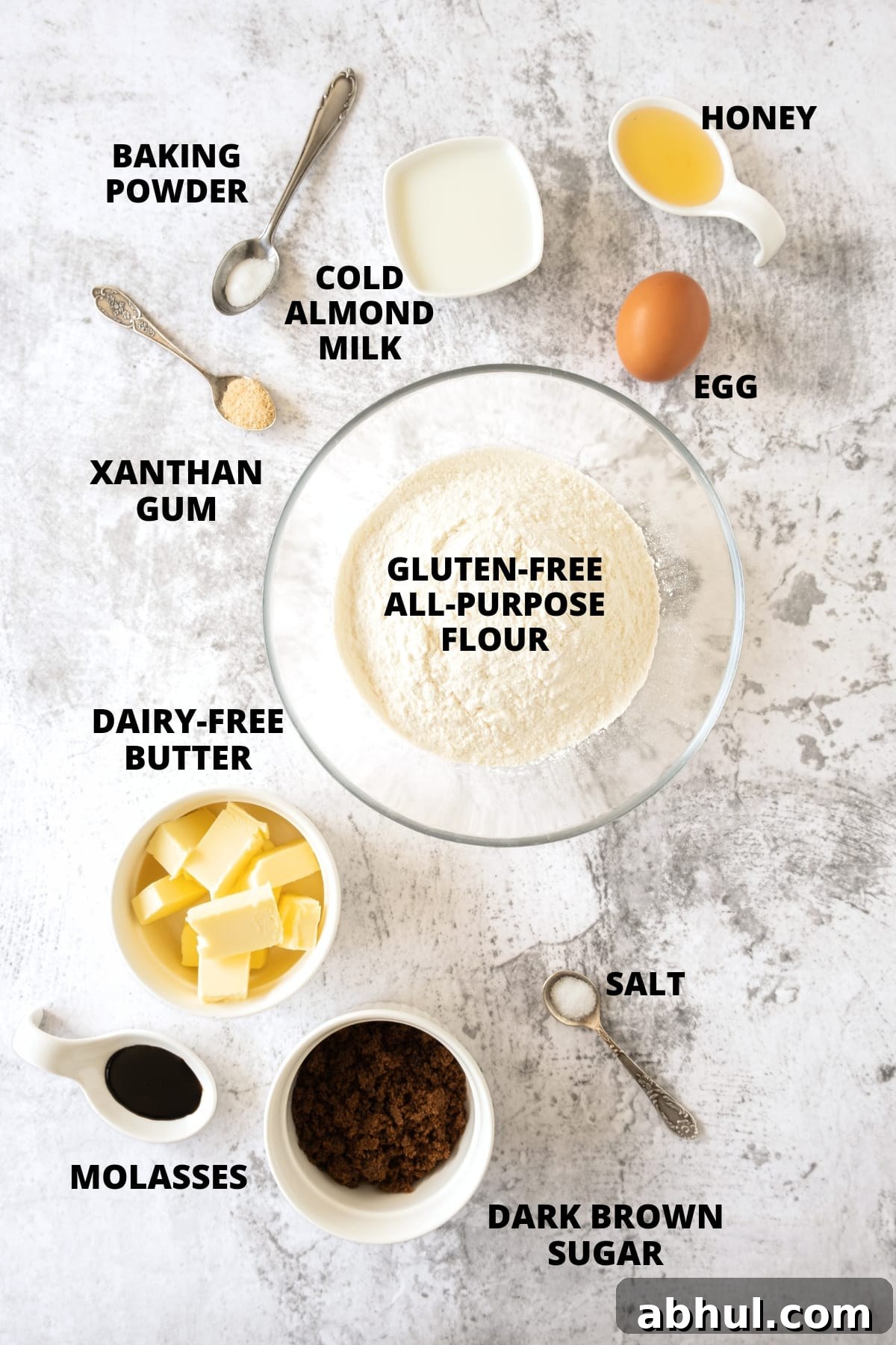Ingredients for gluten-free graham cracker crust recipe laid out on board.