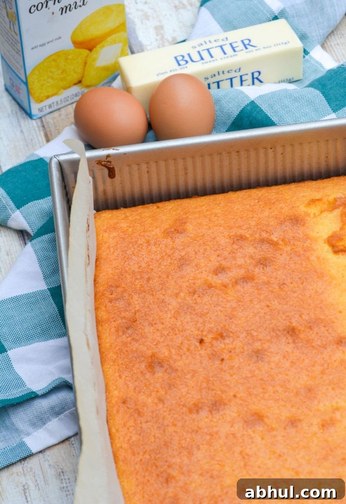 Make Moister Cornbread from a Box 4 a batch of better cornbread made from a box in a parchment lined metal baking pan