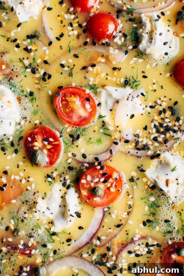 Everything (but the) bagel sheet pan eggs with smoked salmon are a super easy and healthy way to set yourself up for weekday breakfast success! Also the best possible way to indulge in your love of everything bagels WITHOUT eating a bagel.