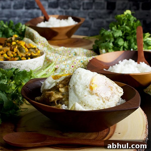 Tomatillo Pulled Chicken and Rice Bowls with fried eggs and roasted corn salsa