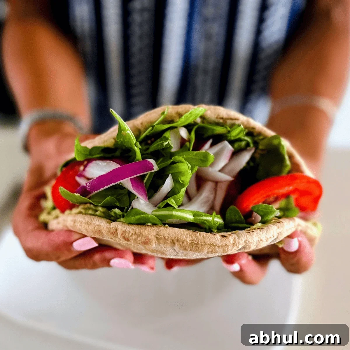 I am holding a White bean avocado sandwich recipe in my hands. 