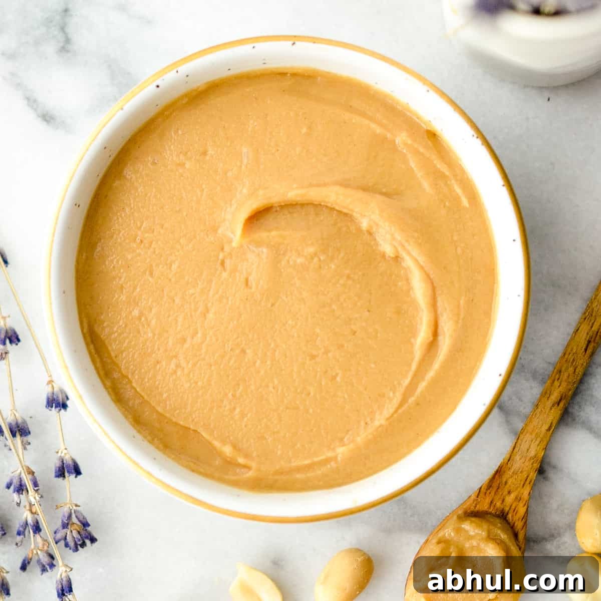 Overhead view of a bowl of homemade vegan peanut butter frosting