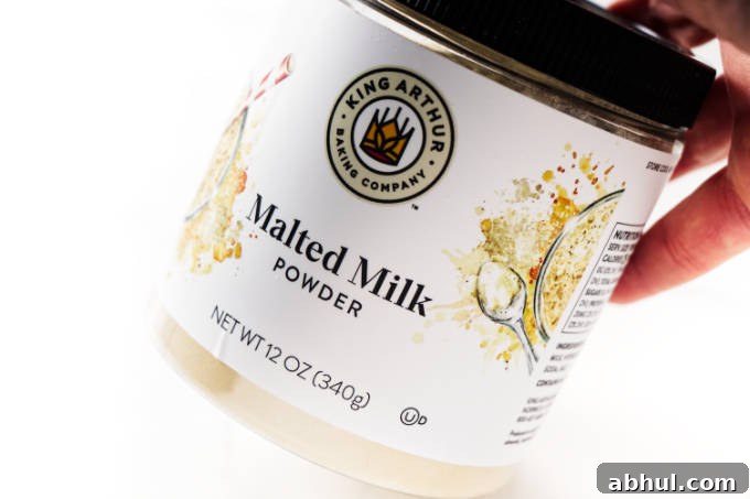 A container of powdered malted milk.
