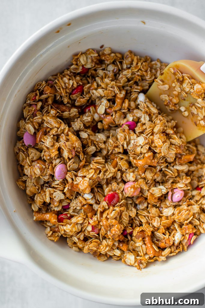Granola bar mix all combined and ready to be pressed into the pan.
