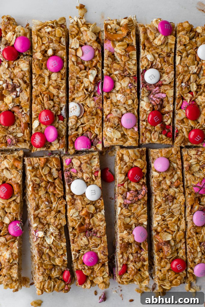 Flat-lay of freshly-cut M&M pretzel granola bars.