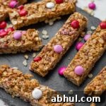 A slate tray filled with M&M pretzel granola bars.