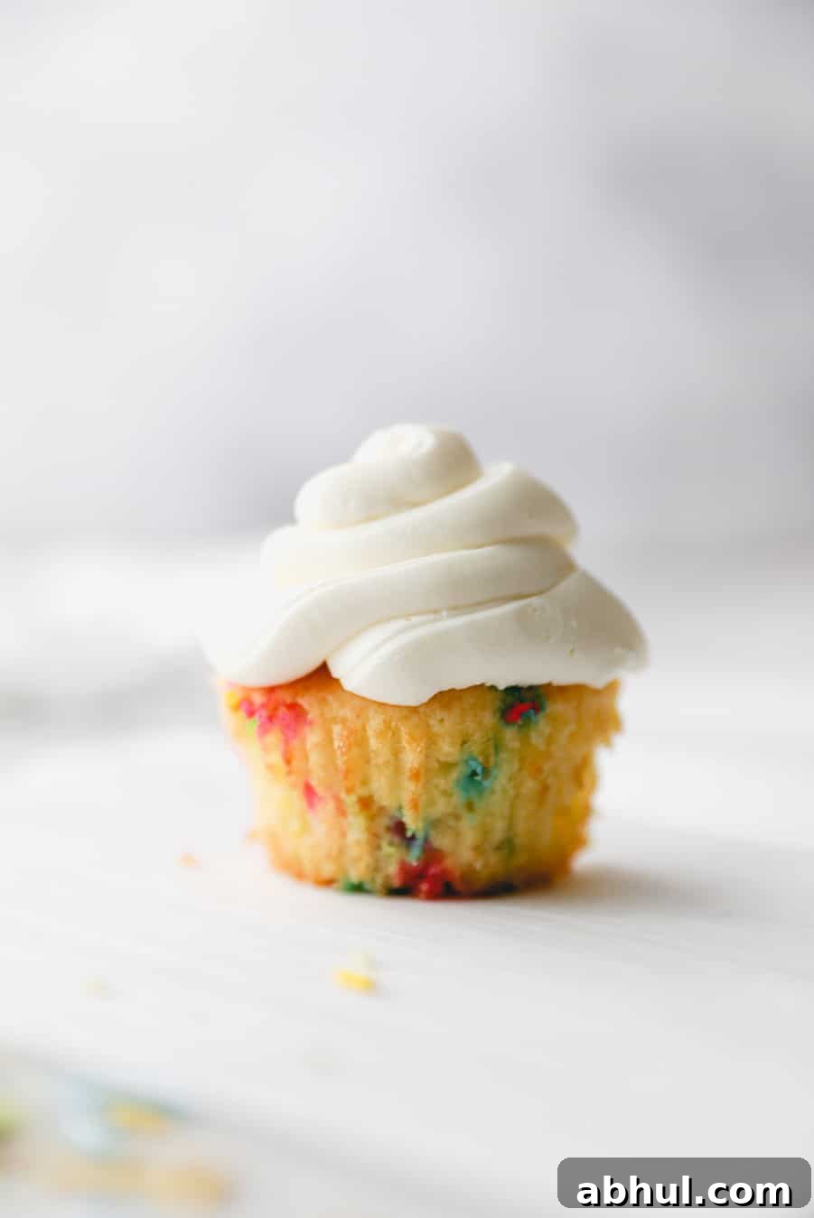 Funfetti Cupcake Recipe: Colorful Sprinkles & Vanilla Frosting 2 one funfetti cupcake with vanilla buttercream.