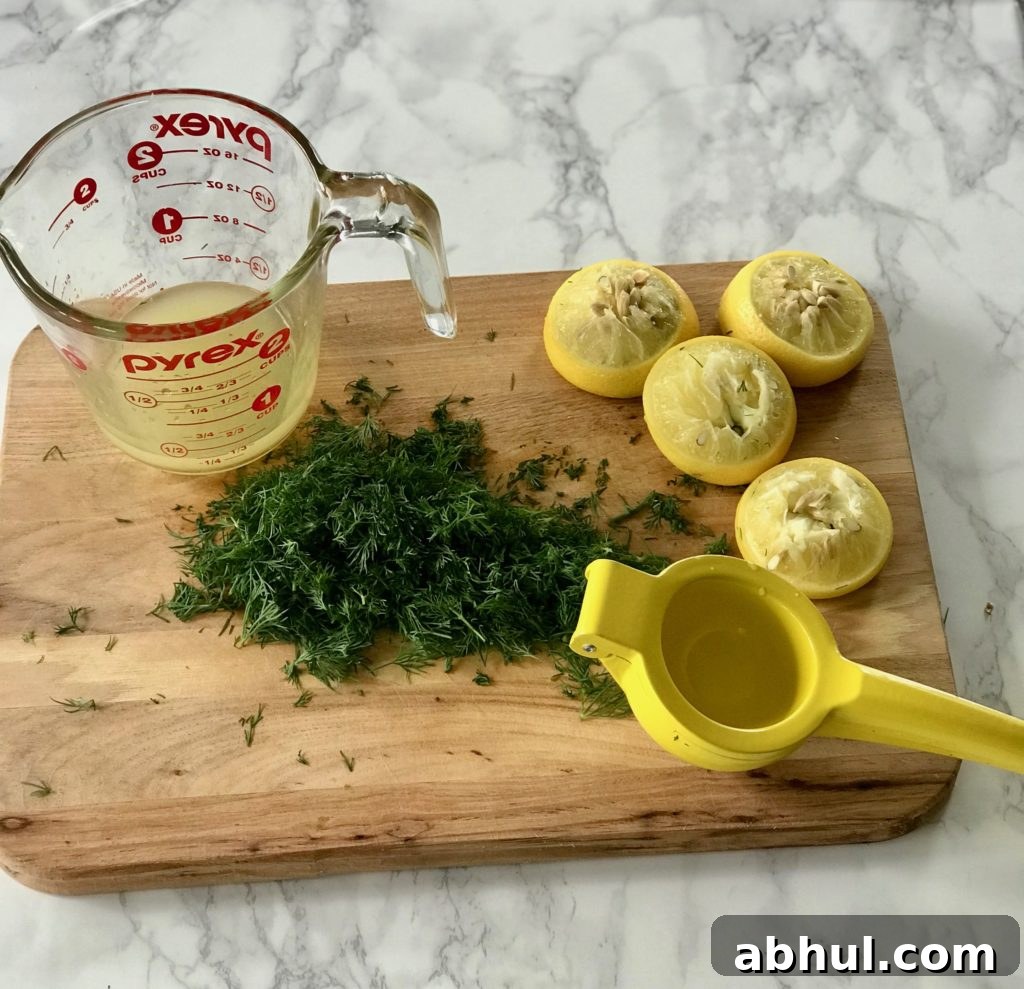 Lemon and dill mixed for a dressing. 