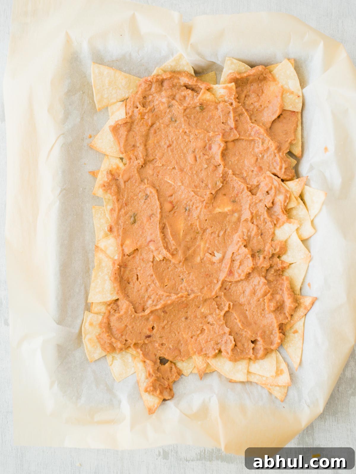 chips and beans layered