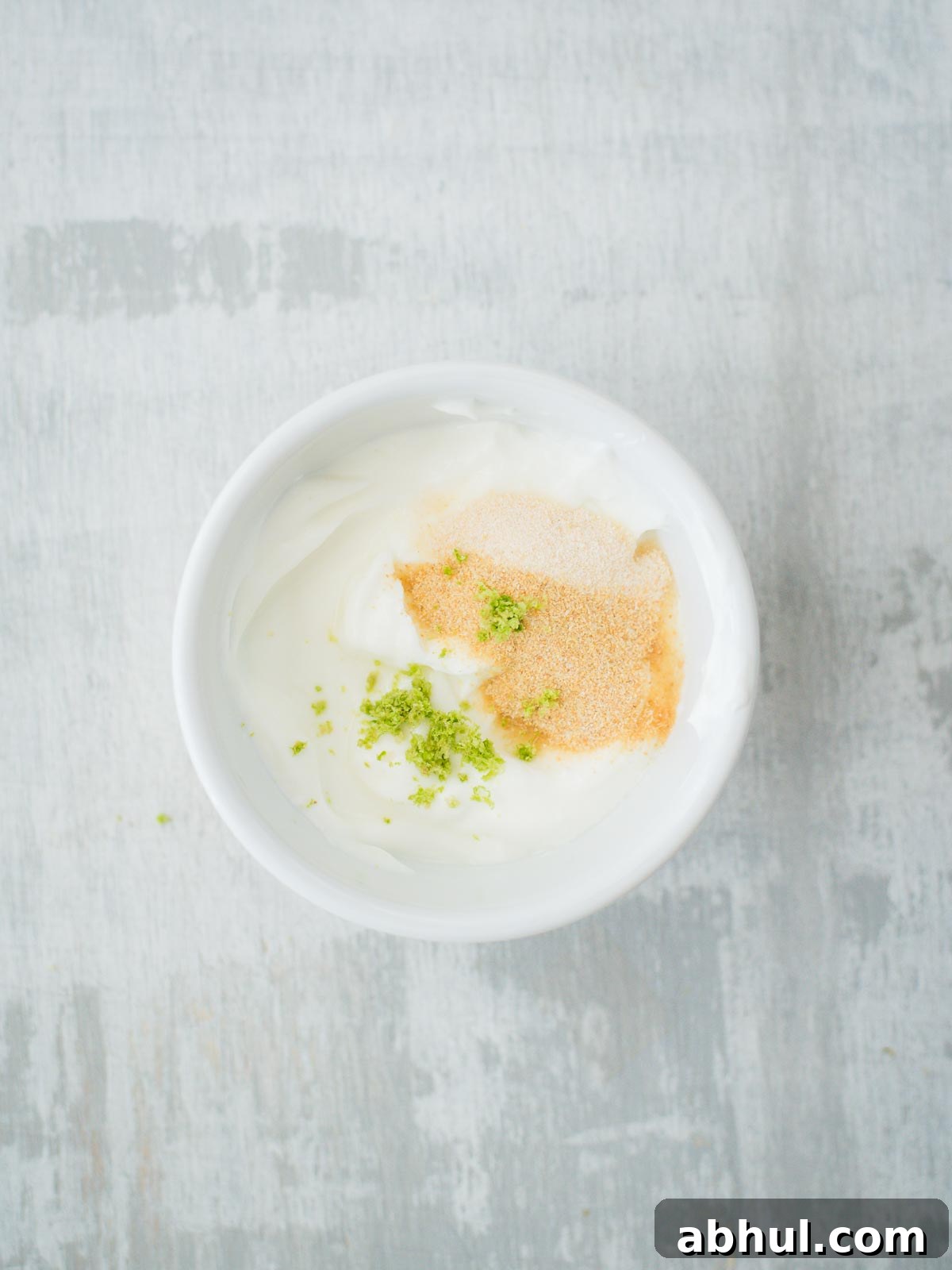 creamy lime sauce ingredients in bowl without lime juice
