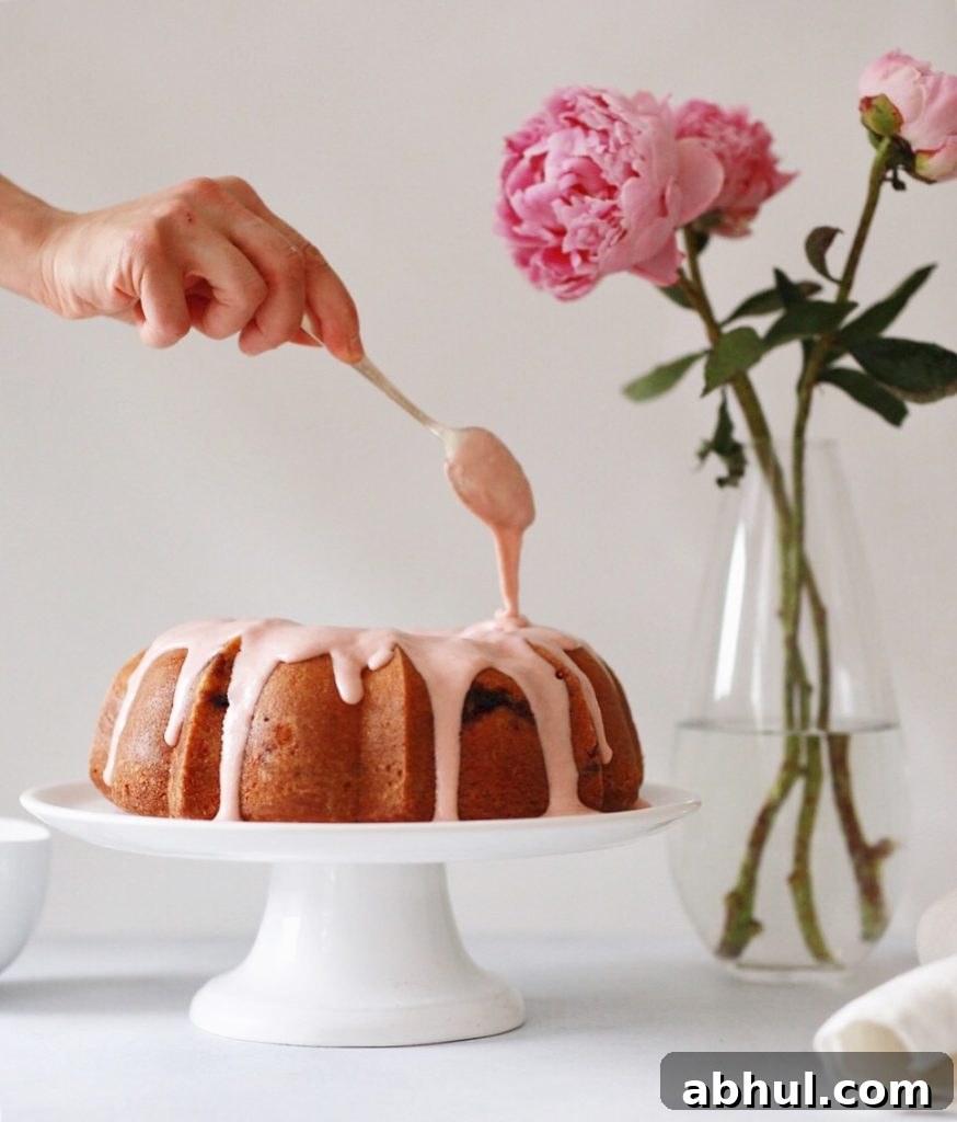 strawberry rhubarb buttermilk bundt with rhubarb cream cheese glaze