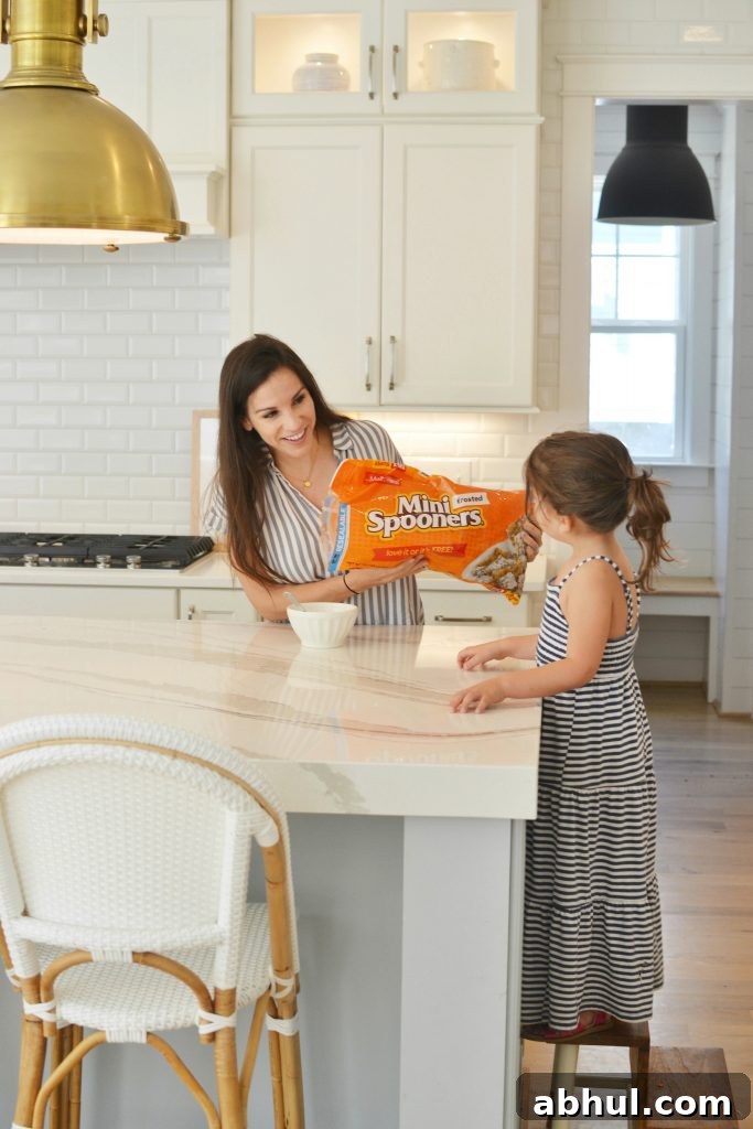 a mom pouring her daughter malt o meal in a kitchen