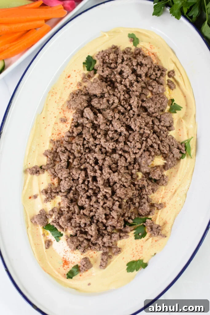Ground Beef Layered Hummus beef on the hummus.