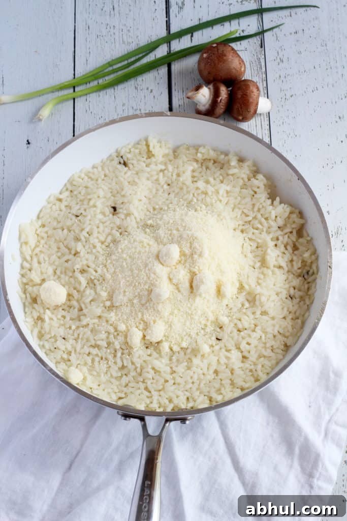 arborio rice in skillet with parmesan