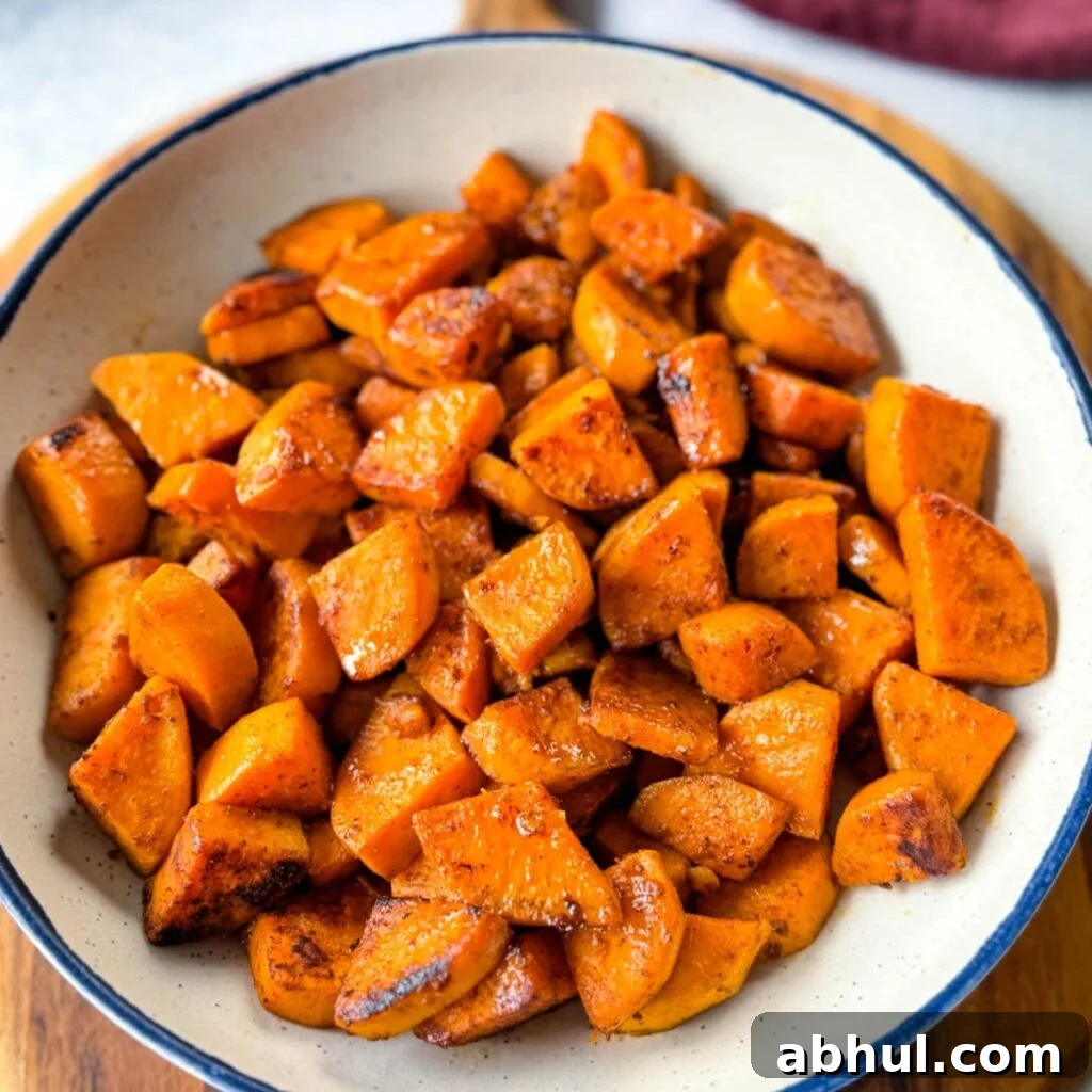 Crispy Fried Sweet Potatoes with Honey and Cinnamon 2 fried sweet potatoes in a white bowl
