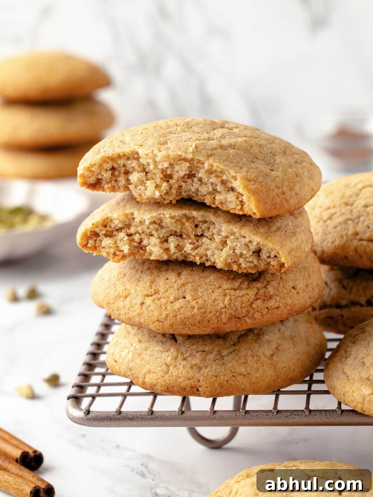 Chai sugar cookies stacked on a plate