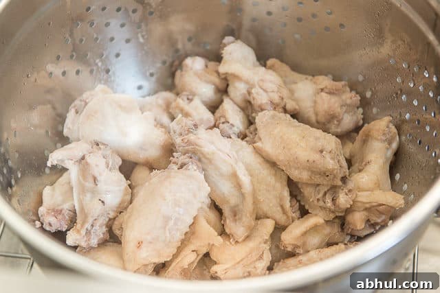 Drained Parboiled Wings in Colander