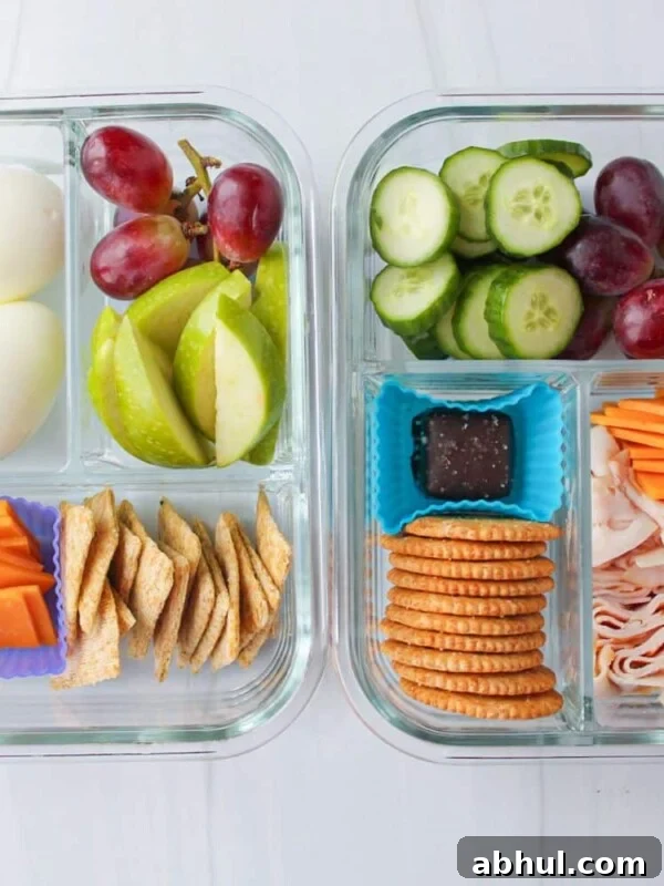 Adult lunchables in glass containers on a countertop.