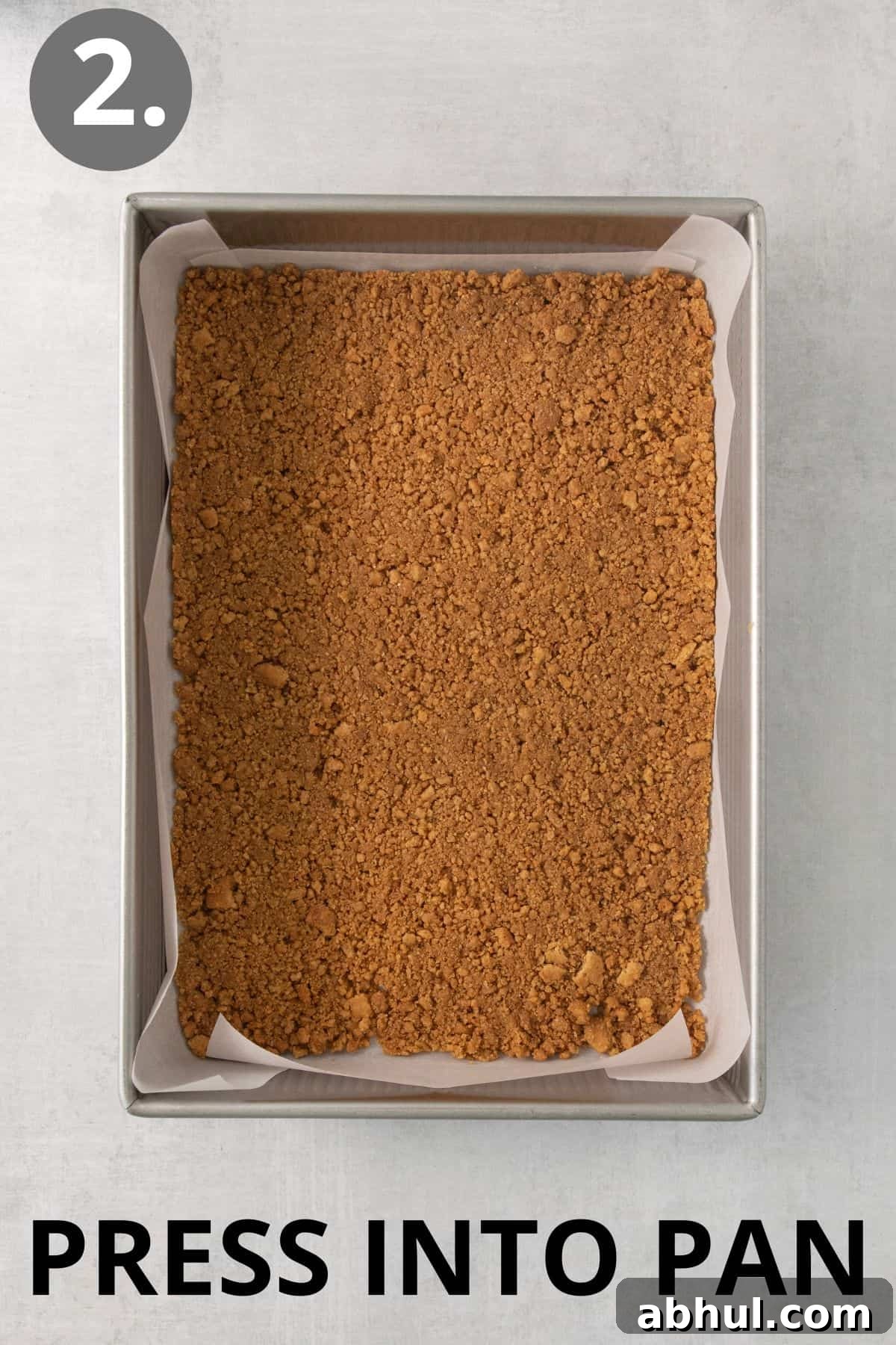 Gluten-Free Seven-Layer Bars Recipe — Chewy Chocolate Coconut Bars 5 Graham cracker crumbs and butter pressed into a pan