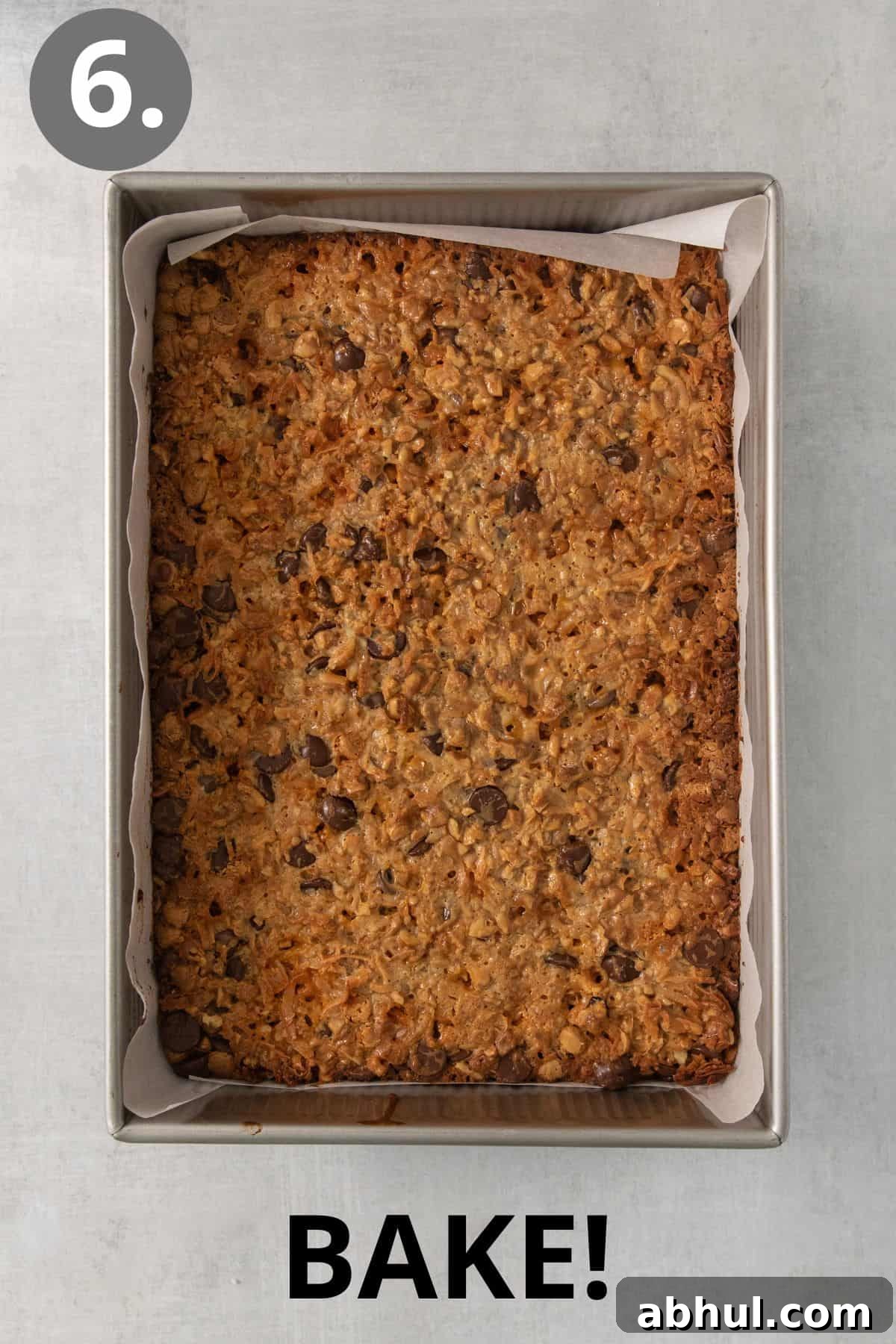 Gluten-Free Seven-Layer Bars Recipe — Chewy Chocolate Coconut Bars 9 Baked 7-layer bars in a pan