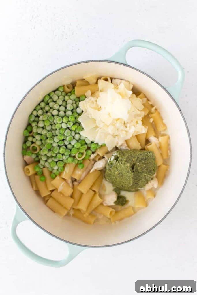 dutch oven with frozen peas parmesan and pesto