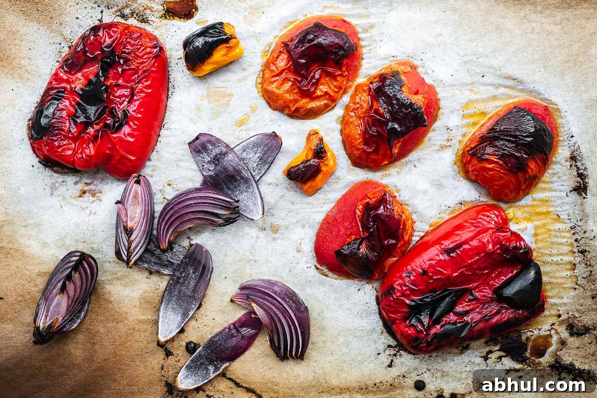 Roasted bell pepper, roma tomato, red onion and habanero peppers for a roasted salsa.