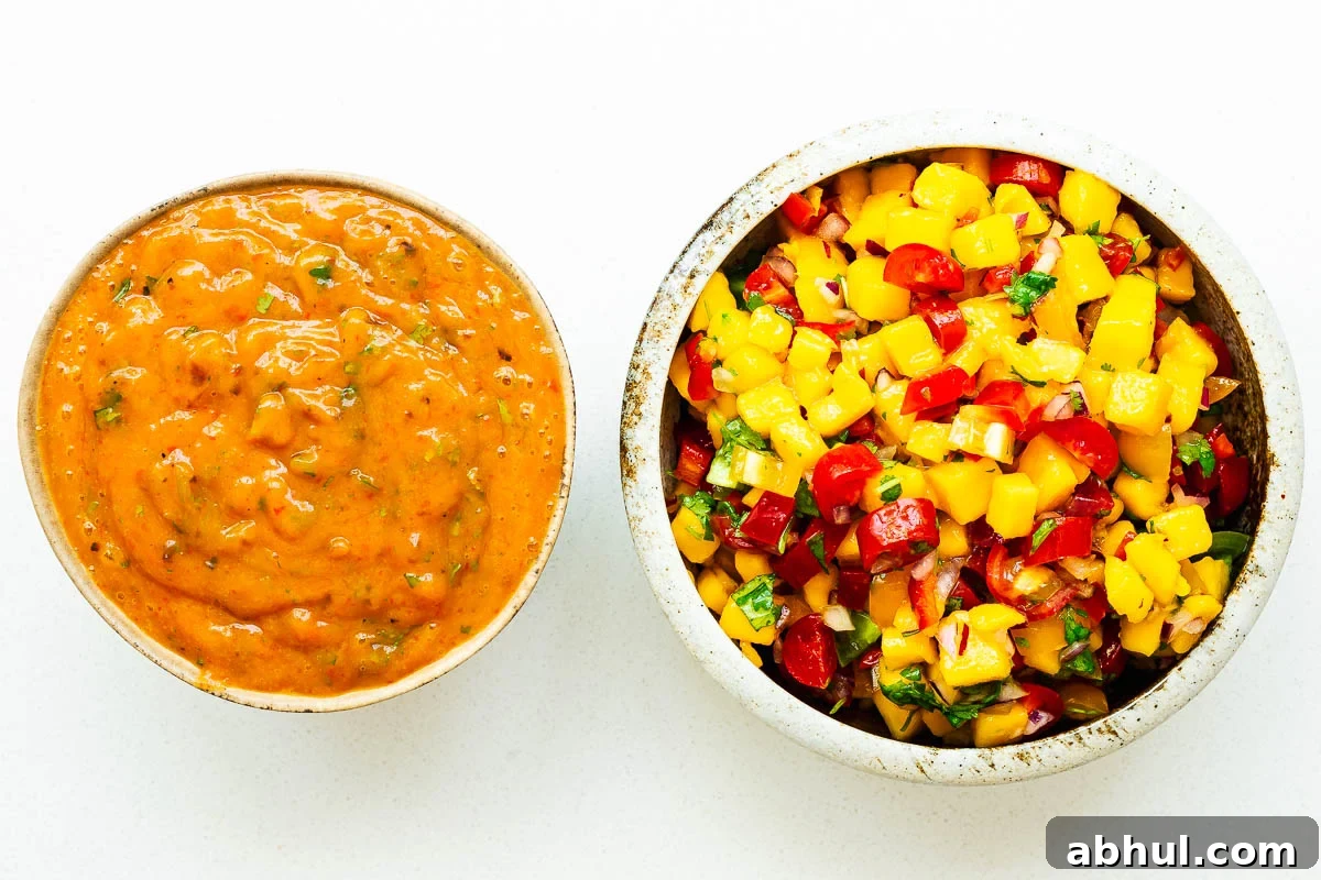 Two bowls of mango habanero salsa, one roasted salsa and one fresh salsa.