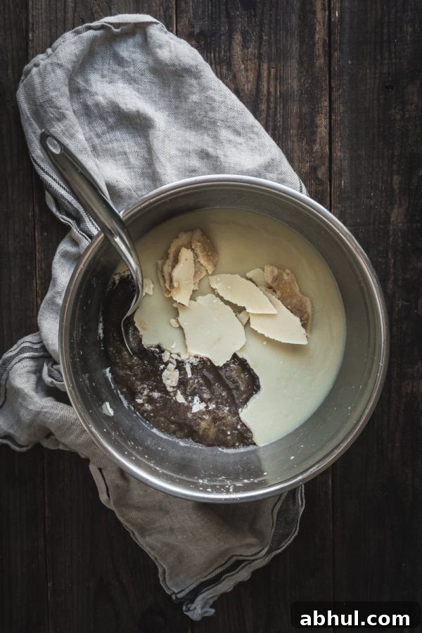 a bowl of bone broth, cooled with a layer of fat