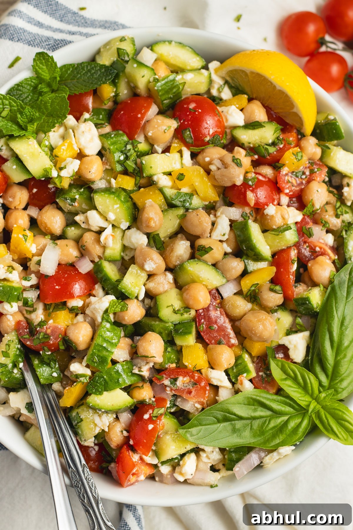 This is a picture of s a bowl of chickpea feta cucumber salad.