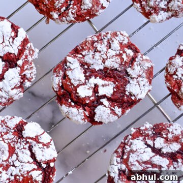 red velvet cool whip cookies cooling on a baking rack.