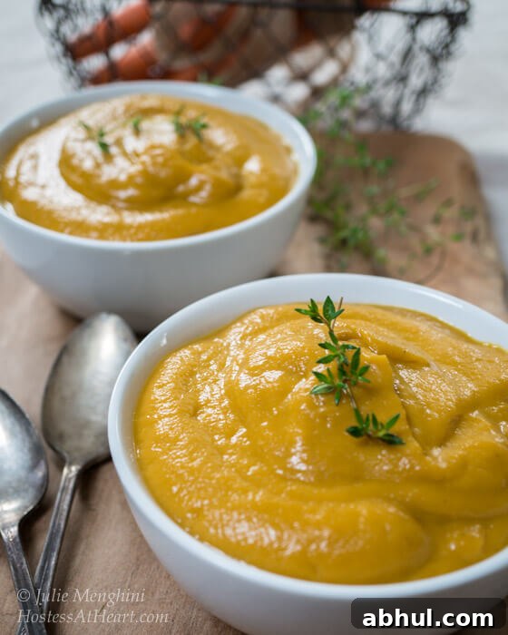 A creamy vegetable soup is not only easy but delicious and healthy too. This soup can also be used as a base for many other recipes. top view of bowl of creamy roasted vegetable soup