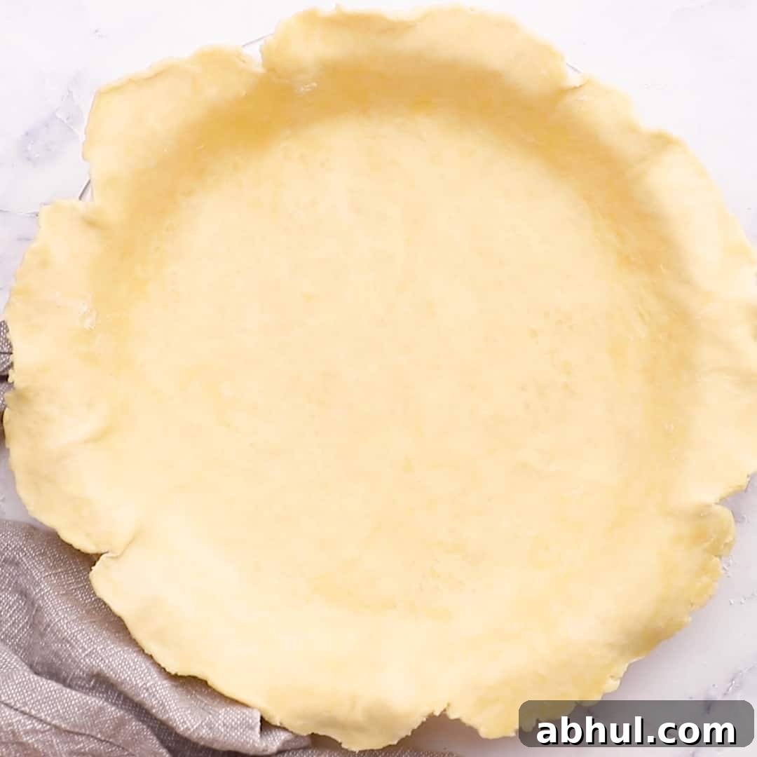 pie crust rolled on a pie dish