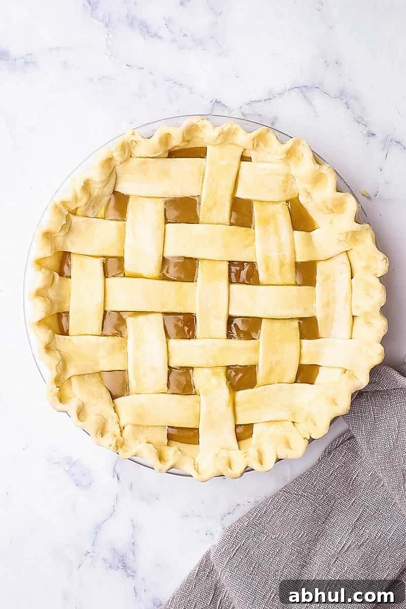 Unbaked lattice pie crust.