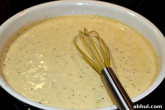 White Wine Alfredo Sauce cooking in sauce pan