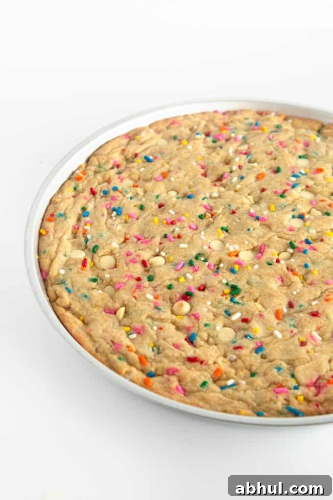 Baked funfetti cookie cake in pan