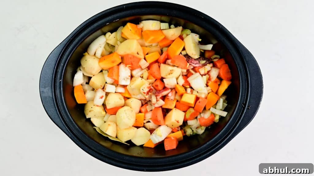 Ingredients for beef stew in a slow cooker